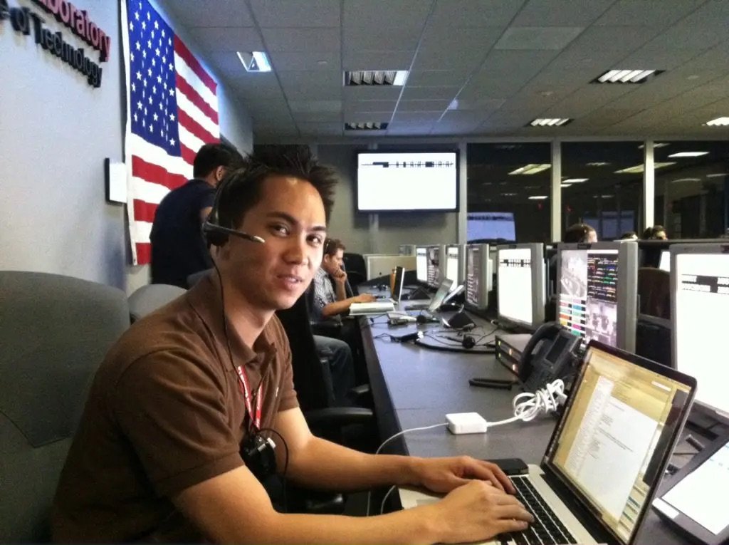 Gregory Villar at a console in JPL mission operations